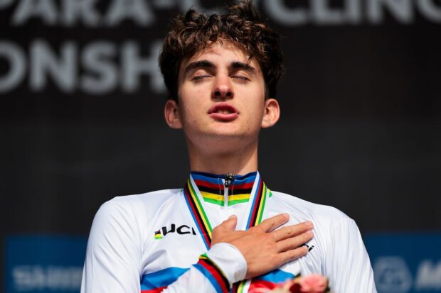 Picture by Alex Whitehead/SWpix.com - 23/09/2024 - 2024 UCI Road and Para-cycling Road World Championships, Zurich, Switzerland - Menâs Junior Individual Time Trial (ITT) Podium - Paul Seixas (France) on the podium receiving the Gold Medal to become World Champion