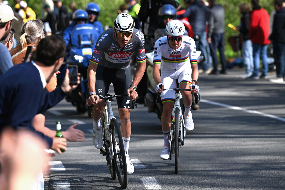 OUDENAARDE, BELGIUM - APRIL 06: (L-R) Mathieu Van Der Poel of Netherlands and Team Alpecin - Deceuninck and Tadej Pogacar of Slovenia and Team UAE Team Emirates - XRG compete during the 109th Ronde van Vlaanderen - Tour des Flandres 2025 - Men's Elite a 269km one day race from Bruges to Oudenaarde / #UCIWT / on April 06, 2025 in Oudenaarde, Belgium. (Photo by Dario Belingheri/Getty Images)