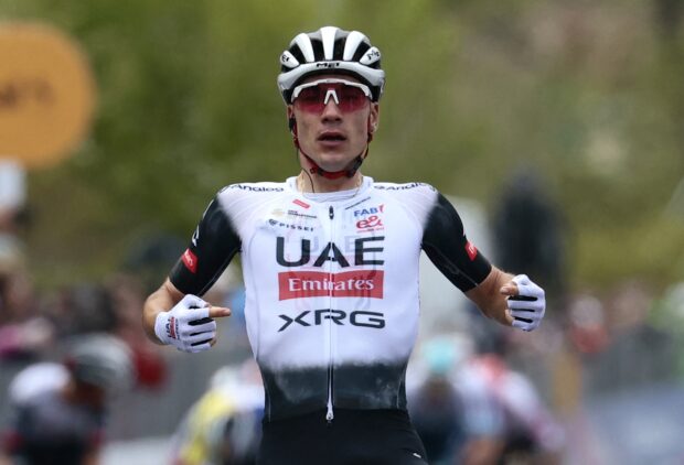 Juan Ayuso celebrates for his UAE Team Emirates-XRG squad as he crosses the Giro d'Italia stage 7 finish with his first Grand Tour stage victory