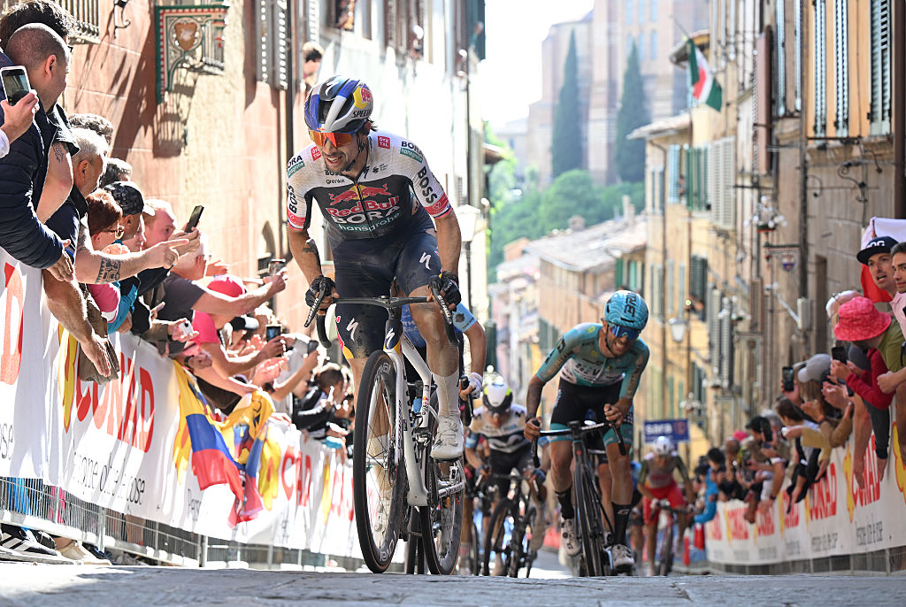 Giro d'Italia 2025: Primoz Roglic (Red Bull-Bora-Hansgrohe) climbing into Siena