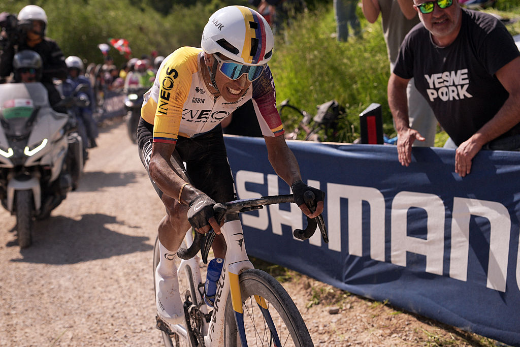 Giro d'Italia 2025: Ineos Grenadiers' Colombian rider Egan Bernal rides on a gravel section during the 9th stage of the 108th Giro d'Italia cycling race in Colle Pinzuto near Siena, on May 18, 2025. (Photo by Marco Alpozzi / POOL / AFP)