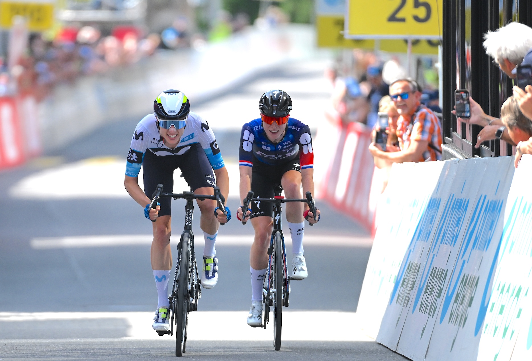 (L-R) Stage winner Marlen Reusser of Switzerland and Team Movistar and Demi Vollering of Netherlands and Team FDJ - SUEZ sprint at finish line during the 5th Tour de Suisse Women 2025, Stage 1 a 95.5km stage from Gstaad to Gstaad 1047m / #UCIWWT / on June 12, 2025 in Gstaad, Switzerland. (Photo by Tim de Waele/Getty Images)