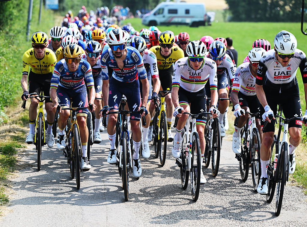 2025 Critérium du Dauphiné stage 3: world champion Tadej Pogačar rides in the peloton