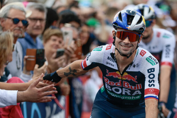 Red Bull-Bora-Hansgrohe's Slovenian rider Primoz Roglic greets the fans prior to the start of the 14th stage of the 108th Giro d'Italia cycling race of 195kms from Treviso in Italy to Nova Gorica in Slovenia on May 24, 2025. (Photo by Luca Bettini / AFP) (Photo by LUCA BETTINI/AFP via Getty Images)