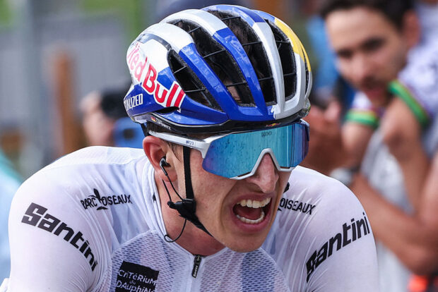 Red Bull - BORA - hansgrohe's German rider Florian Lipowitz cycles to the finish line of the 7th stage of the 77th edition of the Criterium du Dauphine cycling race, 131,6 km between Grand-Aigueblanche and Valmeinier, on June 14, 2025. (Photo by Anne-Christine POUJOULAT / AFP) (Photo by ANNE-CHRISTINE POUJOULAT/AFP via Getty Images)