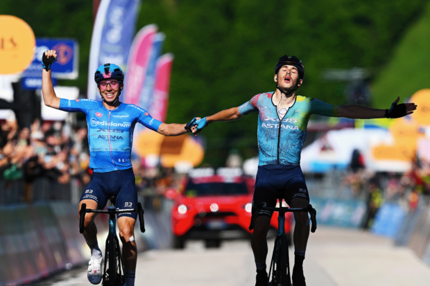 (L-R) Lorenzo Fortunato of Italy - Blue Mountain Jersey as second place and the stage winner Christian Scaroni of Italy and Team XDS Astana crosses the finish line together and celebrate victory during the 108th Giro d'Italia 2025, Stage 16 a 203km stage from Piazzola sul Brenta to San Valentino (Brentonico) 1316m / #UCIWT / on May 27, 2025 in San Valentino, Italy. (Photo by Tim de Waele/Getty Images)