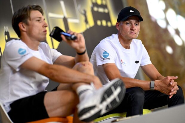LILLE, FRANCE - JULY 03: (L-R) Jasper Philipsen of Belgium and Mathieu Van Der Poel during the press conference of Team Alpecin - Deceuninck prior to the 112th Tour de France 2025 / #UCIWT / on July 03, 2025 in Lille, France. (Photo by Dario Belingheri/Getty Images)