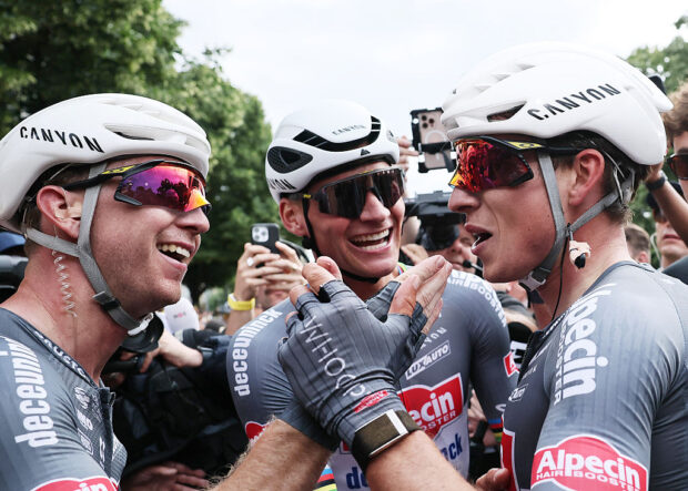 2025 Tour de France stage 1: teammates Mathieu van der Poel, Kaden Groves and winner Jasper Philipsen celebrate the win