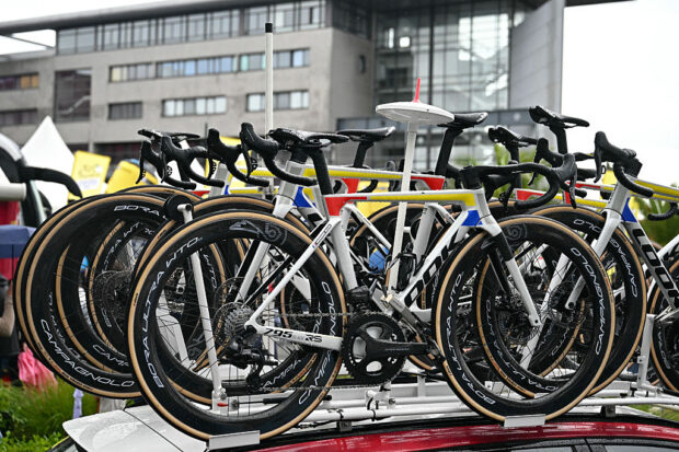Bicycles sit on a roof-rack atop a Cofidis team vehicle before the start of the 3rd stage of the 112th edition of the Tour de France cycling race, 178.3 km between Valenciennes and Dunkerque (Dunkirk), Northern France, on July 7, 2025. The Cofidis team had 11 bicycles stolen from a team truck on the night of July 5 to July 6, before the Tour de France's 2nd stage, in northern France. (Photo by Loic VENANCE / AFP)