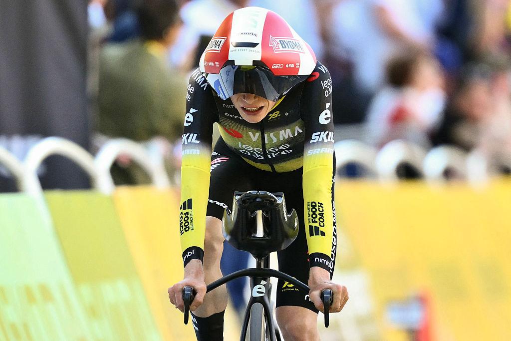 Team Visma - Lease a bike team's Danish rider Jonas Vingegaard cycles to the finish line of the 5th stage of the 112th edition of the Tour de France cycling race, 33 km individual time trial starting and finishing in Caen, northwestern France, on July 9, 2025. (Photo by Marco BERTORELLO / AFP) (Photo by MARCO BERTORELLO/AFP via Getty Images)