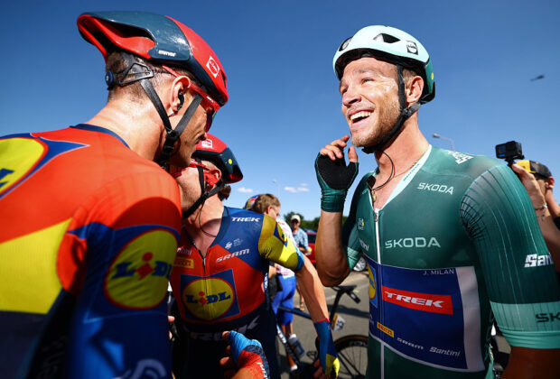 LAVAL, FRANCE - JULY 12: (L-R) Edward Theuns of Belgium and stage winner Jonathan Milan of Italy and Team Lidl - Trek - Green Sprint Jersey react after the 112th Tour de France, Stage 8 a 197km stage from Saint-Meen-le-Grand to Laval (Espace Mayenne) / #UCIWT / on July 12, 2025 in Laval, France. (Photo by Sarah Meyssonnier - Pool/Getty Images)