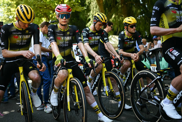 (From L) Team Visma - Lease a bike team's US rider Matteo Jorgenson, Team Visma - Lease a bike team's Danish rider Jonas Vingegaard and Team Visma - Lease a bike team's US rider Sepp Kuss, and Team Visma - Lease a bike team's Belgian rider Tiesj Benoot await the start of the 9th stage of the 112th edition of the Tour de France cycling race, 174.1 km between Chinon and Chateauroux, central France, on July 13, 2025. (Photo by Loic VENANCE / AFP) (Photo by LOIC VENANCE/AFP via Getty Images)