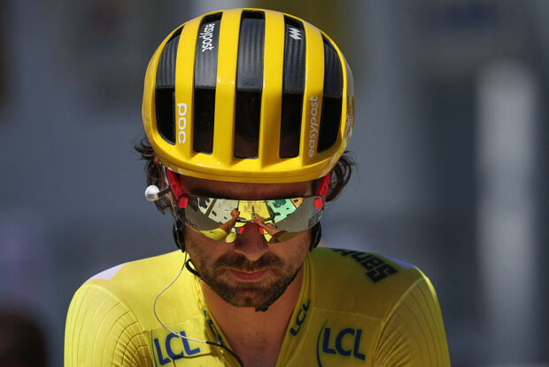 EF Education - EasyPost team's Irish rider Ben Healy wearing the overall leader's yellow jersey awaits the start of the 11th stage of the 112th edition of the Tour de France cycling race, 156.8 km starting and finishing in Toulouse, southwestern France, on July 16, 2025. (Photo by Anne-Christine POUJOULAT / AFP) (Photo by ANNE-CHRISTINE POUJOULAT/AFP via Getty Images)