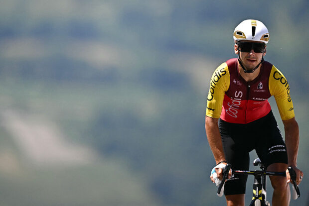 Cofidis team's French rider Bryan Coquard cycles to the finish line of the 13th stage of the 112th edition of the Tour de France cycling race, 10.9 km individual time trial between Loudenvielle and Peyragudes, in the Pyrenees mountains of southwestern France, on July 18, 2025. (Photo by Loic VENANCE / AFP)