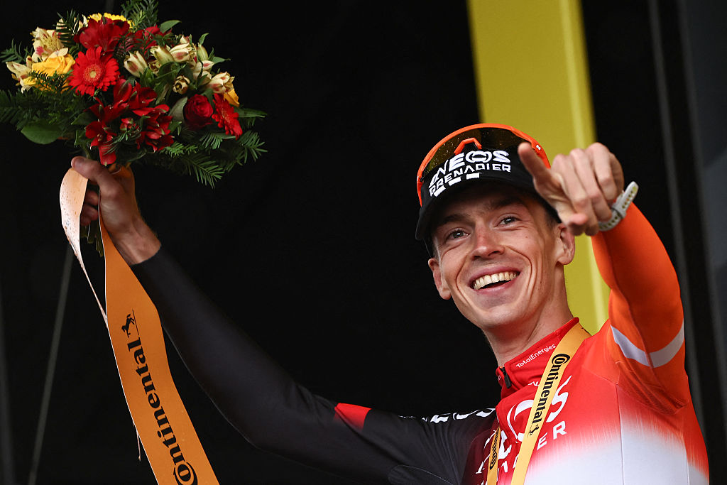 INEOS Grenadiers team's Dutch rider Thymen Arensman celebrates on the podium after winning the 19th stage of the 112th edition of the Tour de France cycling race, 93.1 km between Albertville and La Plagne, in the French Alps, on July 25, 2025. The 19th stage of the Tour de France was shorted from its initial 129.9 km route, bypassing the Col des Saisies where an outbreak of nodular dermatitis in a herd of cattle was discovered, prompting organizers to modify the race route. (Photo by Anne-Christine POUJOULAT / AFP) (Photo by ANNE-CHRISTINE POUJOULAT/AFP via Getty Images)
