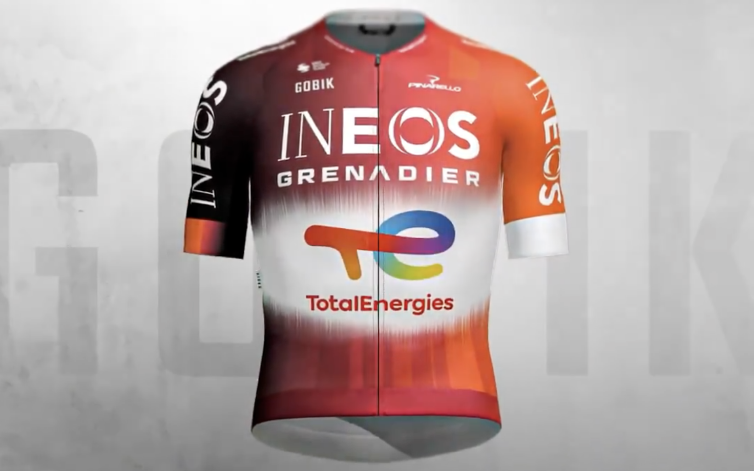 A computer generated image of Ineos Grenadiers' new jersey, an orange design with a white fade area showing the TotalEnergies logo