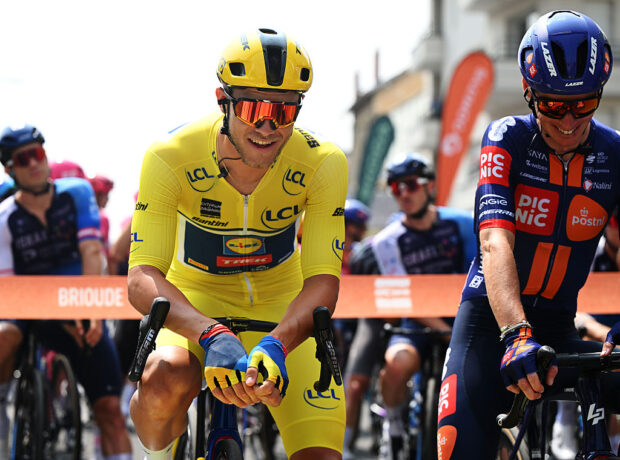BRIOUDE, FRANCE - JUNE 10: (L-R) Jonathan Milan of Italy and Team Lidl - Trek - Yellow leader jersey and Romain Bardet of France and Team Picnic PostNL prior to the 77th Criterium du Dauphine 2025, Stage 3 a 207.2km stage from Brioude to Charantonnay / #UCIWT / on June 10, 2025 in Brioude, France. (Photo by Dario Belingheri/Getty Images)