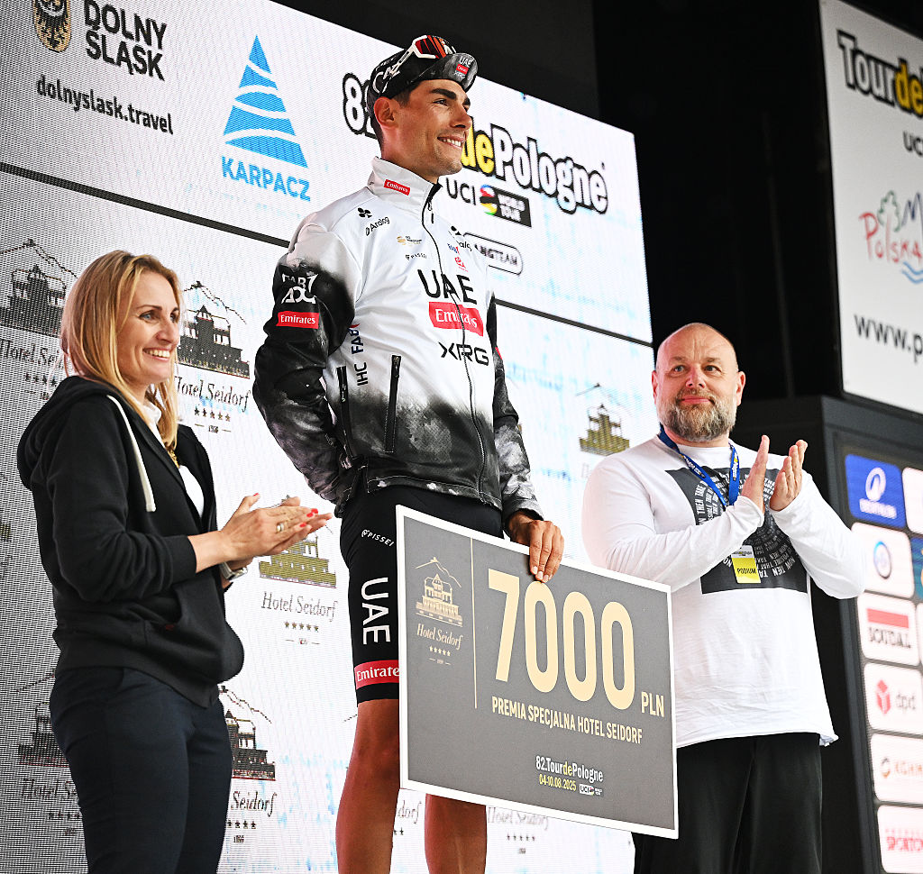 KARPACZ, POLAND - AUGUST 05: Filippo Baroncini of Italy and UAE Team Emirates - XRG celebrates at podium as special prize winner during the 82nd Tour de Pologne 2025, Stage 2 a 149.4km stage from Hotel Golebiewski Karpacz to Karpacz / #UCIWT / on August 05, 2025 in Karpacz, Poland. (Photo by Luc Claessen/Getty Images)