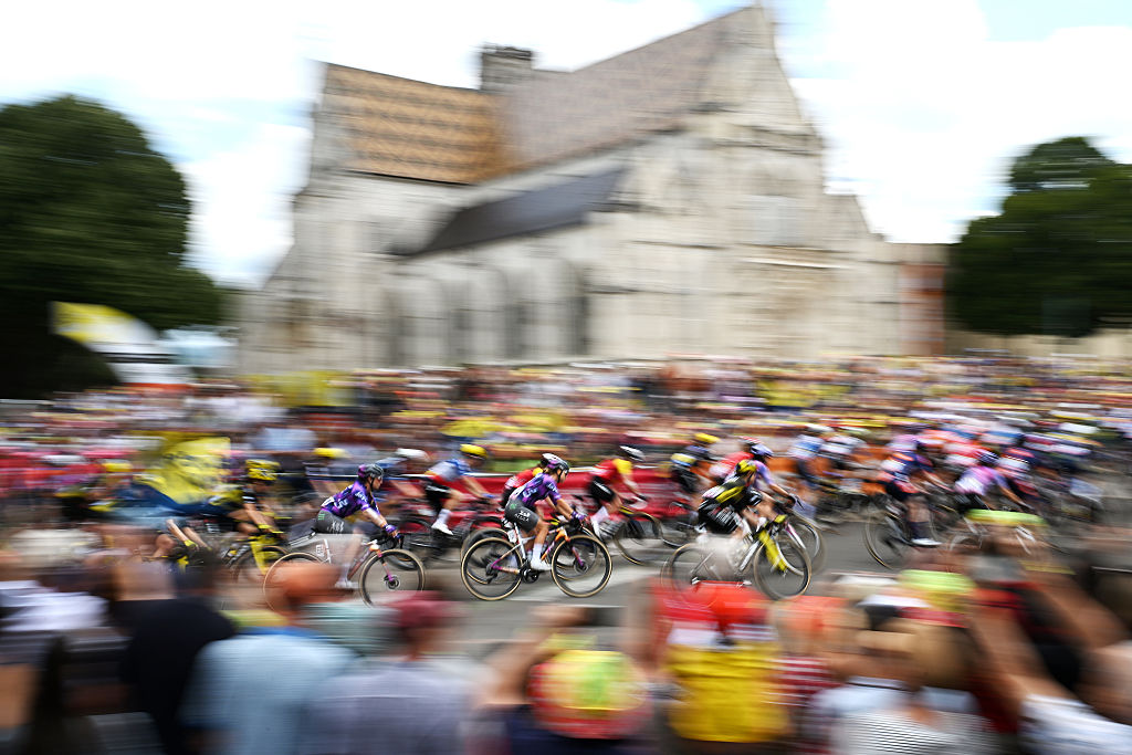 A general view of the peloton with the Brou Monastery in the background prior to the 4th Tour de France Femmes 2025, Stage 7 a 159.7km stage from Bourg-en-Bresse to Chambery / #UCIWWT / on August 01, 2025 in Bourg-en-Bresse, France. (Photo by Szymon Gruchalski/Getty