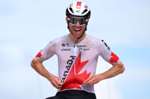 PUERTO DE ANCARES, SPAIN - AUGUST 30: Michael Woods of Canada and Team Israel - Premier Tech celebrates at finish line as stage winner during the La Vuelta - 79th Tour of Spain 2024 - Stage 13 a 176km stage from Lugo to Puerto de Ancares 1659m / #UCIWT / on August 30, 2024 in Puerto de Ancares, Spain. (Photo by Tim de Waele/Getty Images)