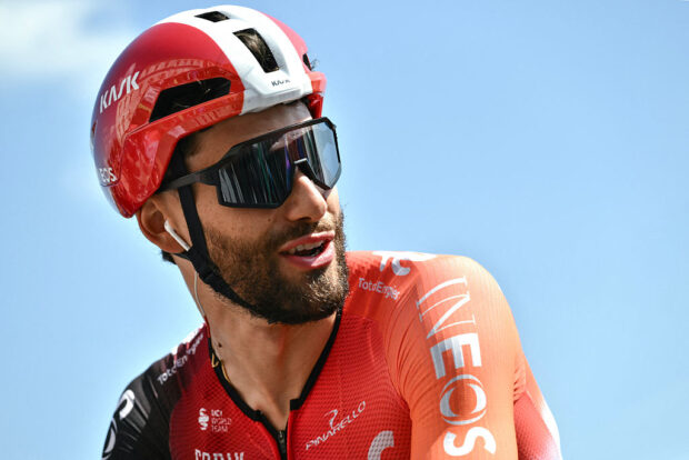 Team Ineos' Italian rider Filippo Ganna arrives to compete in the first stage of the Vuelta a Espana, a 183 km race between Torino - Reggia di Venaria and Novara, in Italy's Piemonte region, on August 23, 2025. (Photo by Marco BERTORELLO / AFP)
