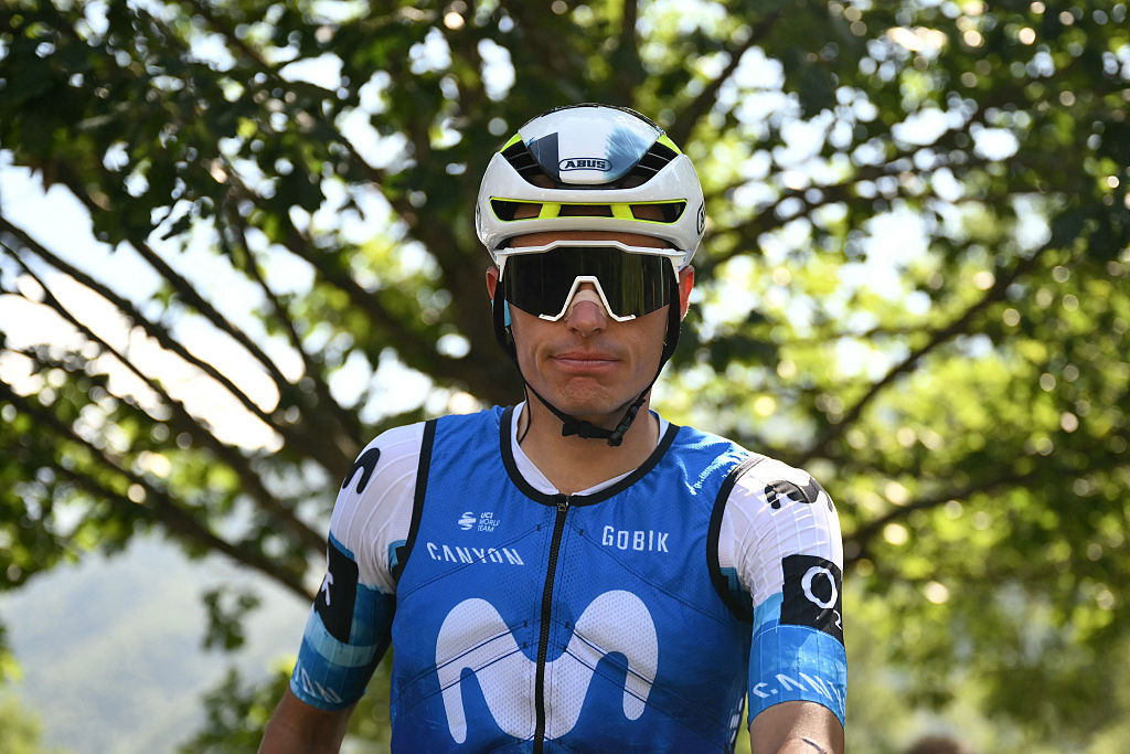 Movistar Team's Spanish rider Enric Mas waits to take the start of the 13th stage of the 112th edition of the Tour de France cycling race, 10.9 km individual time trial between Loudenvielle and Peyragudes, in the Pyrenees mountains of southwestern France, on July 18, 2025. (Photo by Marco BERTORELLO / AFP)