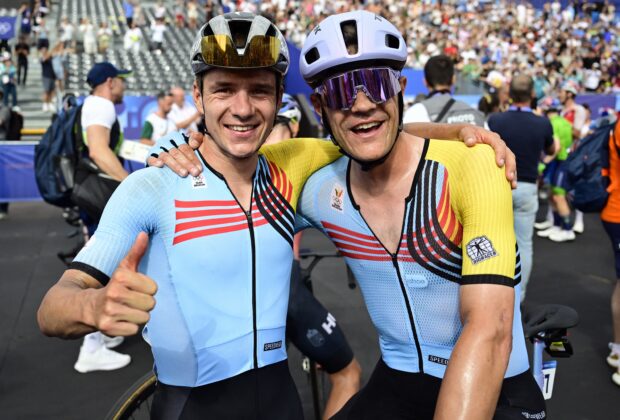 Belgian cyclist Remco Evenepoel and Belgian cyclist Jasper Stuyven celebrate after the men's road race at the Paris 2024 Olympic Games, on Saturday 03 August 2024 in Paris, France. The Games of the XXXIII Olympiad are taking place in Paris from 26 July to 11 August. The Belgian delegation counts 165 athletes competing in 21 sports. BELGA PHOTO DIRK WAEM (Photo by DIRK WAEM / BELGA MAG / Belga via AFP) (Photo by DIRK WAEM/BELGA MAG/AFP via Getty Images)