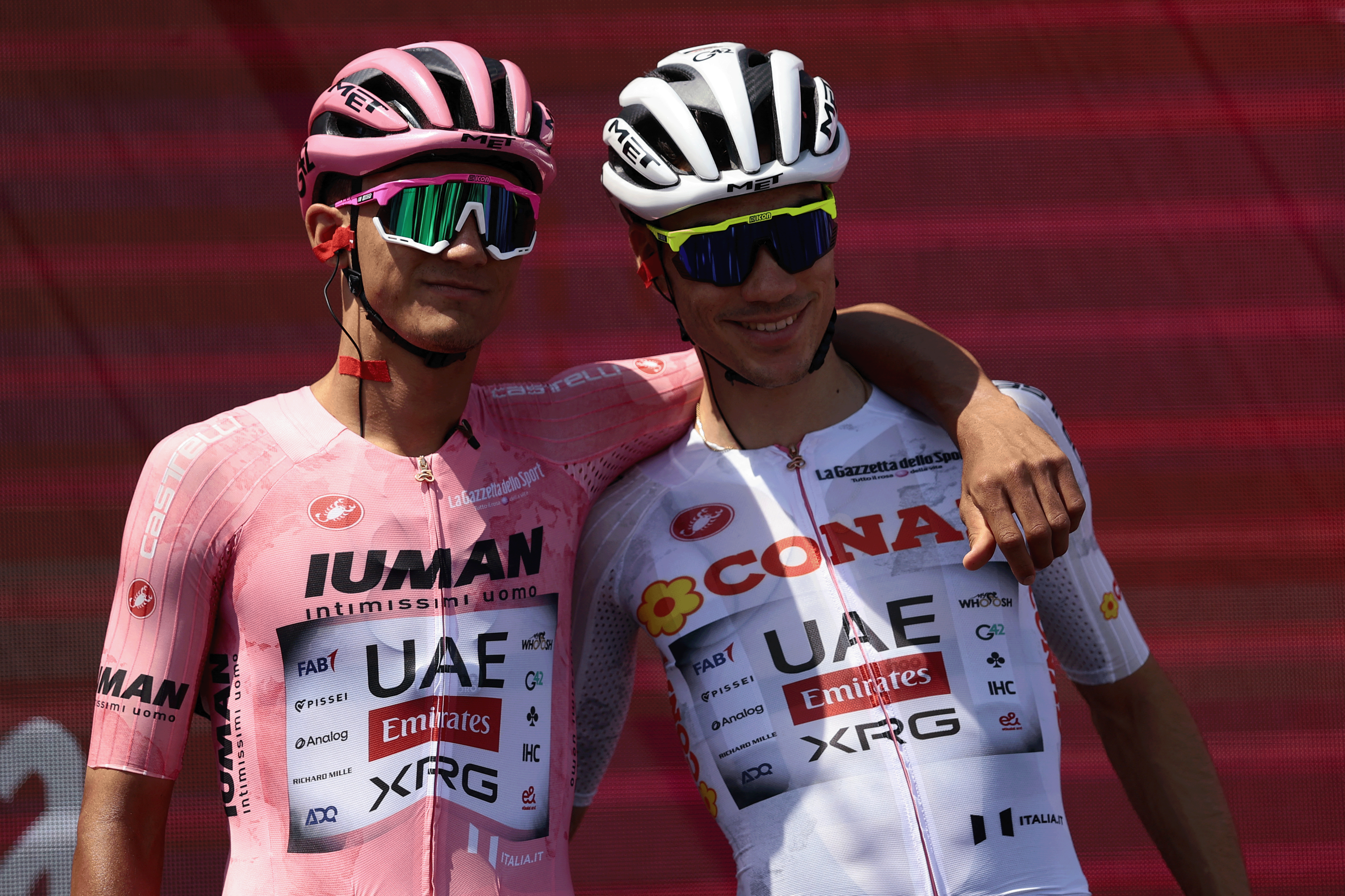Pink Jersey UAE Team Emirates XRG's Mexican rider Isaac Del Toro poses with teammate UAE Team Emirates XRG's Spanish rider Juan Ayuso before the 11th stage of the 108th Giro d'Italia cycling race of 186kms from Viareggio to Castelnovo ne' Monti on May 21, 2025. (Photo by Luca Bettini / AFP) (Photo by LUCA BETTINI/AFP via Getty Images)