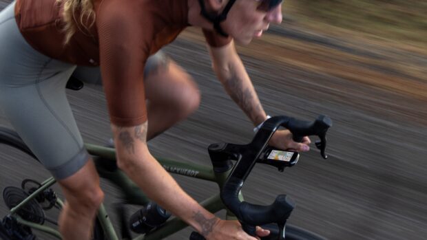 A cyclist riding with a Garmin cycling comptuer