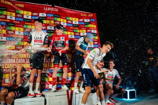 Jonas Vingegaard celebrates victory at the 2025 Vuelta during an improvised podium ceremony