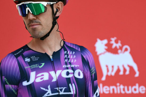 Team Jayco-AlUla's Australian rider Ben O'Connor is presented on stage before the start of the Vuelta a Espana, a 183 km race between Torino - Reggia di Venaria and Novara, in Italy's Piemonte region, on August 23, 2025. (Photo by Marco BERTORELLO / AFP) (Photo by MARCO BERTORELLO/AFP via Getty Images)