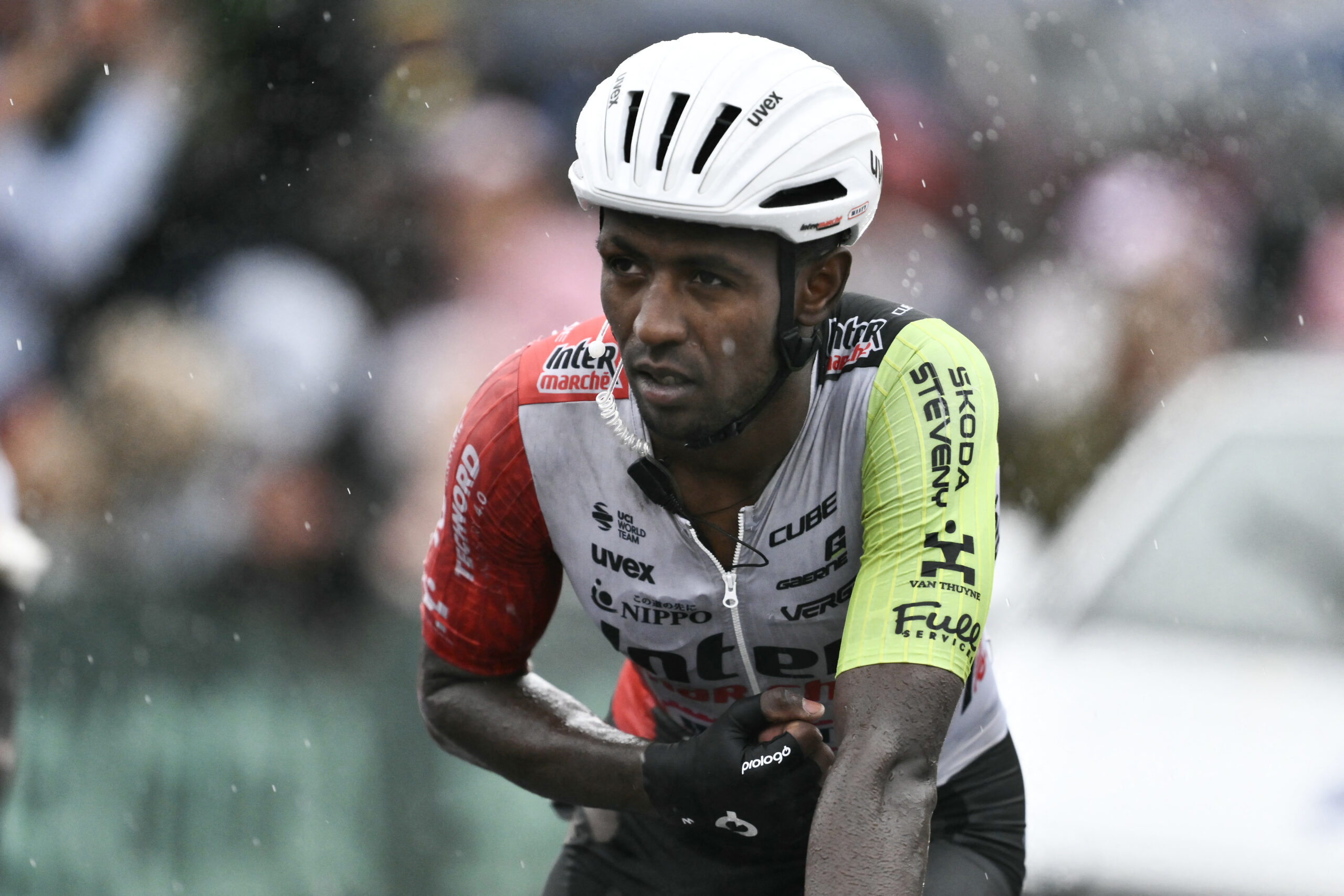Intermarche - Wanty team's Eritrean rider Biniam Girmay crosses the finish line nursing injuries after a mass crash in the final metres of the 17th stage of the 112th edition of the Tour de France cycling race, 160.4 km between Bollene and Valence, southern France, on July 23, 2025. (Photo by Marco BERTORELLO / AFP)