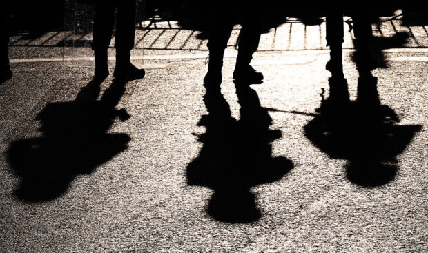 MADRID, SPAIN - SEPTEMBER 14: Police silhouettes during the La Vuelta - 80th Tour of Spain 2025, Stage 21 a 108km stage from Alalpardo to Madrid / The race is neutralised due to disturbances in central Madrid caused by pro-Palestinian protests / #UCIWT / on September 14, 2025 in Madrid, Spain. (Photo by Tim de Waele/Getty Images)