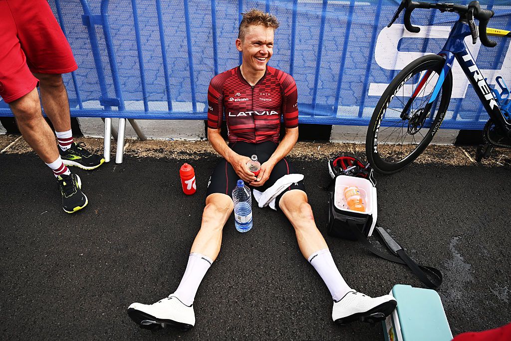 KIGALI, RWANDA - SEPTEMBER 28: Toms Skujins and Team Latvia reacts after the 98th UCI Cycling World Championships Kigali 2025, Men Elite Road Race a 267.5km race from Kigali to Kigali on September 28, 2025 in Kigali, Rwanda. (Photo by Dario Belingheri/Getty Images)