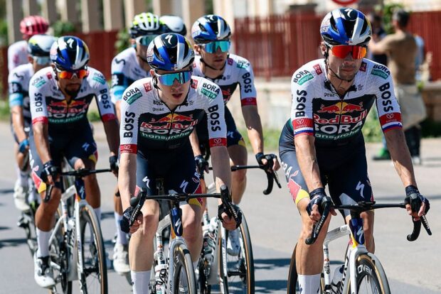 Red Bull-Bora-Hansgrohe's Slovenian rider Primoz Roglic (R) rides ahead of teammates during the 4th stage of the 108th Giro d'Italia cycling race 189kms from Alberobello to Lecce on May 13, 2025. (Photo by Luca Bettini / AFP)