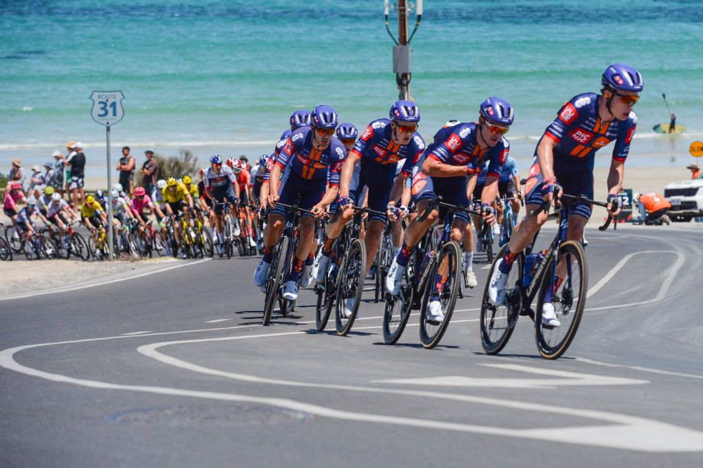 Team Picnic PostNL leads the peloton along the coast during stage 5 of the Tour Down Under cycling race in Adelaide on January 25, 2025. (Photo by Brenton Edwards / AFP)