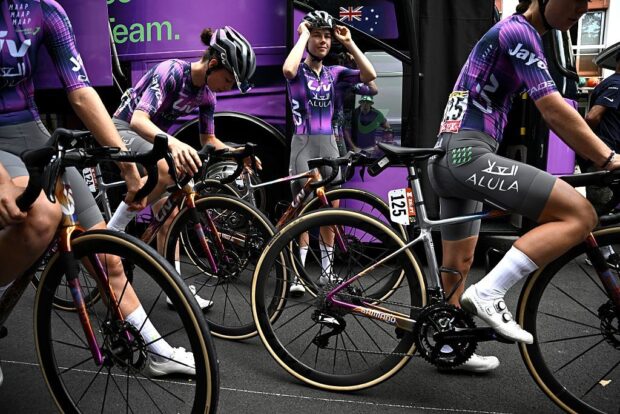 Liv-Alula-Jayco team's Dutch rider Silke Smulders adjusts her glasses as Liv-Alula-Jayco team's Dutch rider Silke Smulders (R) and the team await prior to the start of the 6th stage (out of 9) of the fourth edition of the Women's Tour de France cycling race, 123.7 km from Clermont-Ferrand to Ambert, in Clermont-Ferrand, central France on July 31, 2025. (Photo by JULIEN DE ROSA / AFP) (Photo by JULIEN DE ROSA/AFP via Getty Images)