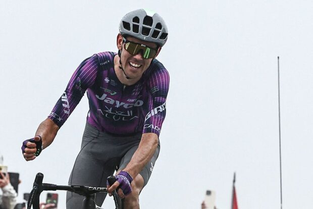 TOPSHOT - Team Jayco AlUla team's Australian rider Ben O'Connor cycles to the finish line to win the 18th stage of the 112th edition of the Tour de France cycling race, 171.5 km between Vif and Courchevel Col de la Loze, in the Alps, southeastern France, on July 24, 2025. (Photo by Anne-Christine POUJOULAT / AFP) (Photo by ANNE-CHRISTINE POUJOULAT/AFP via Getty Images)