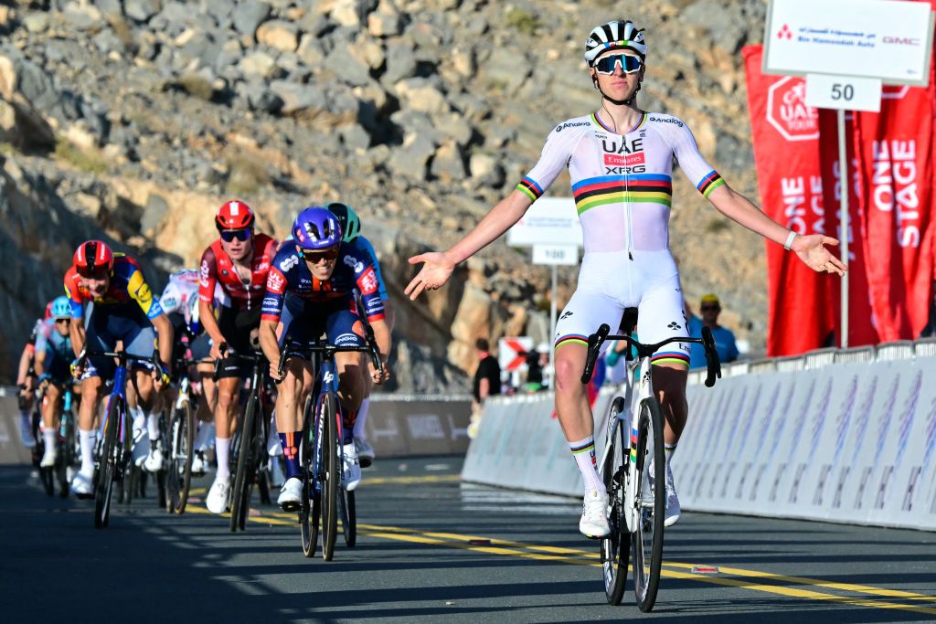 AE Team Emirates' Slovenian rider Tadej Pogacar celebrates winning the third stage of the UAE Tour cycling race from Ras al Khaimah to Jebel Jais in the United Arab Emirates, on February 19, 2025. (Photo by Giuseppe CACACE / AFP)