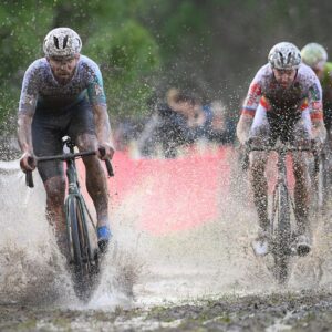 Dutch Joris Nieuwenhuis and Belgian Michael Vanthourenhout pictured in action during the men's elite race of the Cyclocross World Cup, in Terralba, Sardinia, Italy, Sunday 07 December 2025, stage 3 (out of 12) in the World Cup of the 2026-2027 season.BELGA PHOTO DAVID PINTENS (Photo by DAVID PINTENS / BELGA MAG / Belga via AFP)