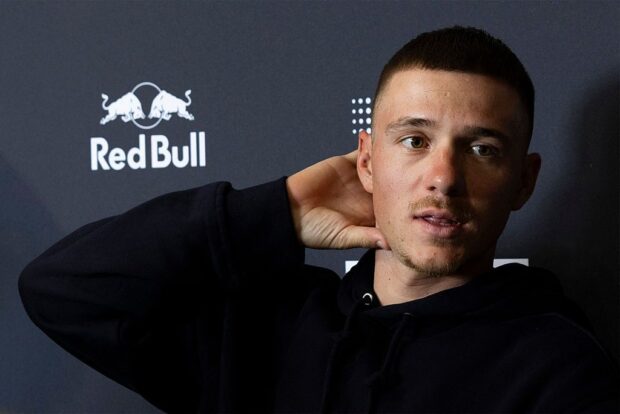 Red Bull–Bora–Hansgrohe’s Belgium rider Remco Evenepoel speaks during a press conference in the media day of their new team in Binissalem on Mallorca Island on December 10, 2025. (Photo by Jaime REINA / AFP)