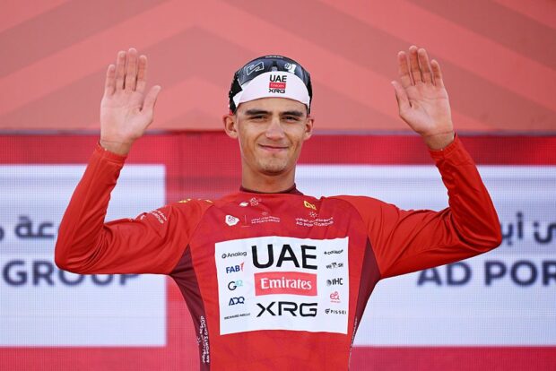 ABU DHABI, UNITED ARAB EMIRATES - FEBRUARY 16: Isaac Del Toro of Mexico and UAE Team Emirates - XRG celebrates at podium as Red Leader Jersey winner during the 8th UAE Tour 2026, Stage 1 a 144km stage from Madinat Zayed Majlis to Liwa Palace on February 16, 2026 in Abu Dhabi, United Arab Emirates. (Photo by Tim de Waele/Getty Images)