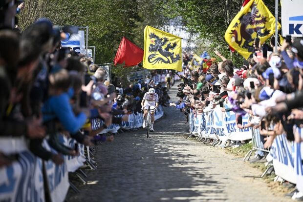 Slovenian Tadej Pogacar of UAE Team Emirates pictured in action during the men's race of the 'Ronde van Vlaanderen/ Tour des Flandres/ Tour of Flanders' one day cycling race, 268,9km from Brugge to Oudenaarde, Sunday 06 April 2025. BELGA PHOTO POOL JAN DE MEULENEIR (Photo by POOL JAN DE MEULENEIR / BELGA MAG / Belga via AFP)