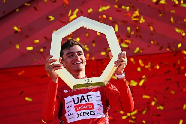 ABU DHABI, UNITED ARAB EMIRATES - FEBRUARY 22: Isaac Del Toro of Mexico and UAE Team Emirates - XRG celebrates at podium as Red Leader Jersey winner during the 8th UAE Tour 2026, Stage 7 a 149km stage from Zayed National Museum to Abu Dhabi Breakwater / #UCIWT / on February 22, 2026 in Abu Dhabi, United Arab Emirates. (Photo by Tim de Waele/Getty Images)
