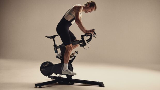 A man riding a Wahoo Kickr Bike Pro