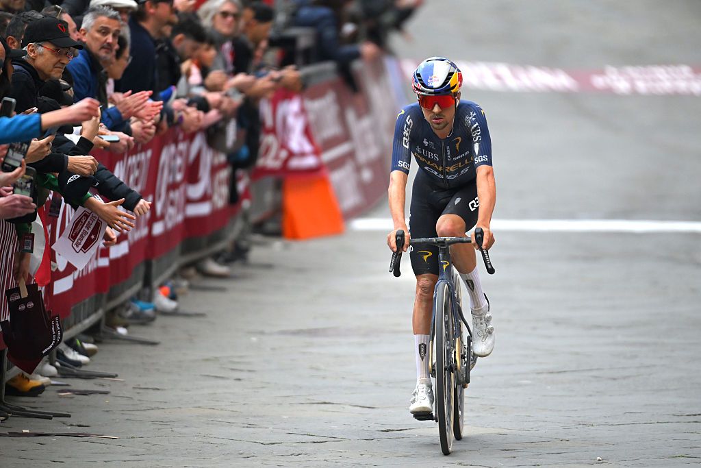 SIENA, ITALY - MARCH 07: Thomas Pidcock of Great Britain and Team Pinarello Q36.5 Pro Cycling crosses the finish line during the 20th Strade Bianche 2026 a 203km one day race from Siena to Siena / #UCIWT / on March 07, 2026 in Siena, Italy. (Photo by Tim de Waele/Getty Images)