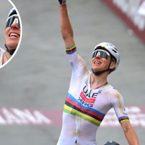 Tadej Pogacar celbrating on the Strade Bianche finish line