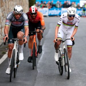 SANREMO, ITALY - MARCH 22: (L-R) Mathieu Van Der Poel of Netherlands and Team Alpecin – Deceuninck, Filippo Ganna of Italy and Team INEOS Grenadiers and Tadej Pogacar of Slovenia and Team UAE Team Emirates compete in the breakaway during the 116th Milano-Sanremo 2025 a 289km one day race from Pavia to Sanremo / #UCIWT / on March 22, 2025 in Sanremo, Italy. (Photo by Luca Bettini - Pool/Getty Images)