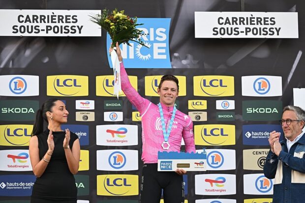 American Luke Lamperti of EF Education - EasyPost celebrates on the podium of the first stage of 84th edition of the Paris-Nice cycling race, 170,9 km from Archeres to Carrieres-sous-Poissy, Sunday 08 March 2026.BELGA PHOTO DAVID PINTENS (Photo by DAVID PINTENS / BELGA MAG / Belga via AFP)