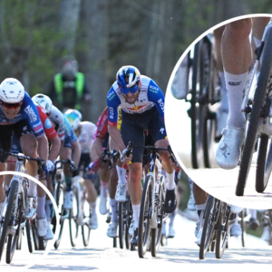 Jasper Philipsen sprinting in odd shoes